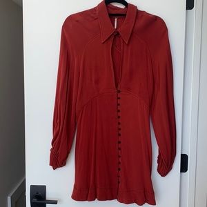 Free people dress/ tunic in burnt orange, low cut opening with black buttons
